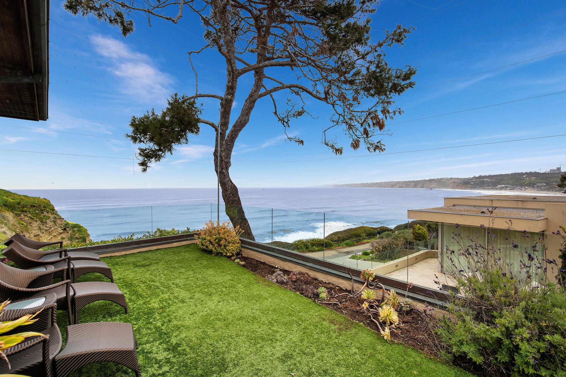 Ocean-view lawn and outdoor seating